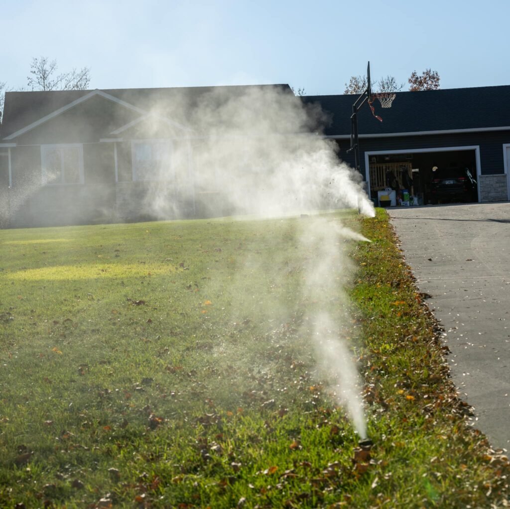 Sprinkler backflow preventer winterized with ball valves set at 45 degrees at a Minnesota home